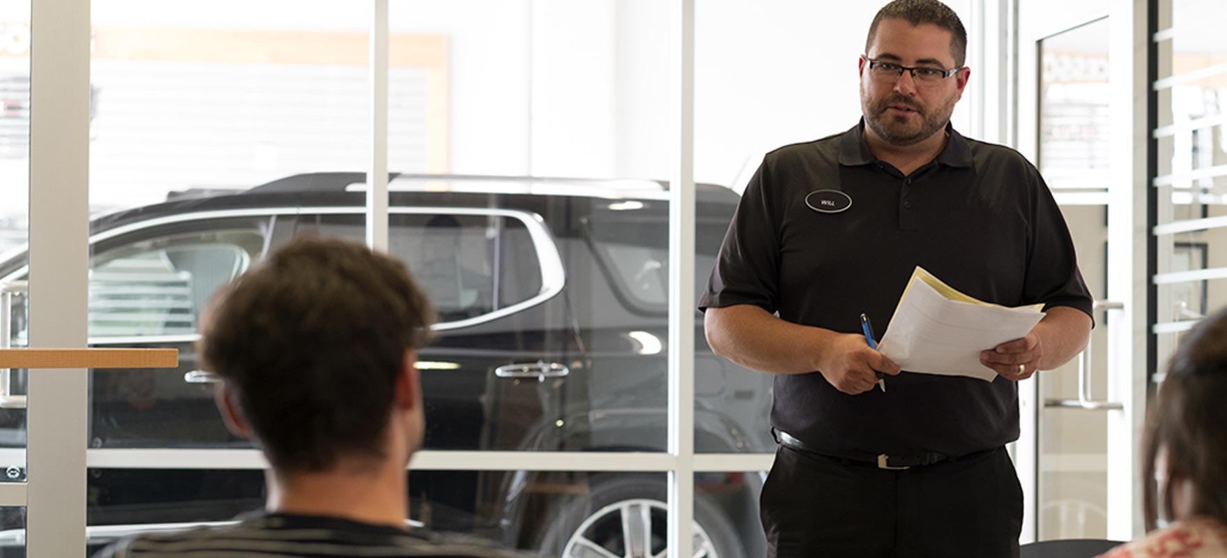 Contact us - staff talking to customers